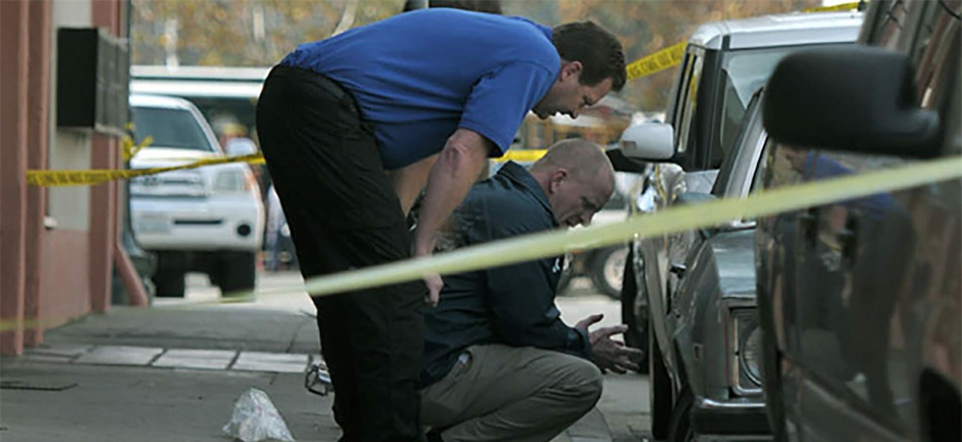 Mike Ullemeyer and Michael Claytor Investigating an active crime scene